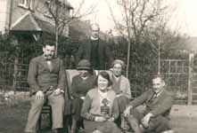 Gordon Jacob with family members in a garden